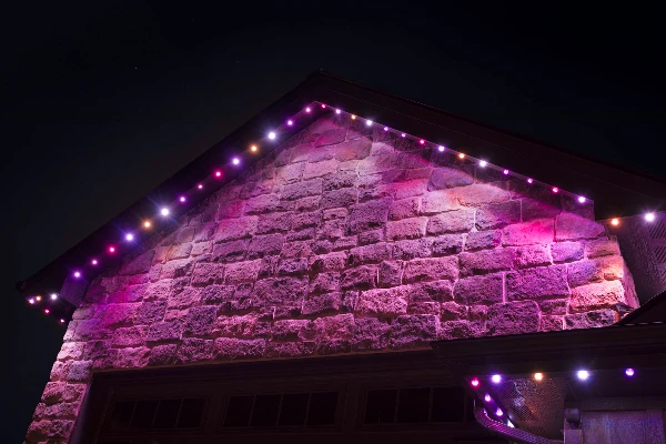 Christmas red and white candy-cane pattern along a long roofline