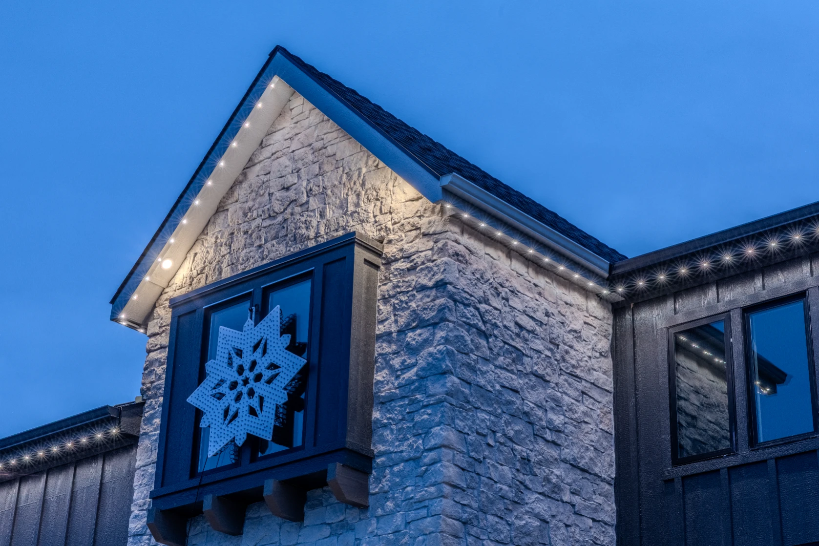 Bright white security lighting covering the side yard and walkway of a family home